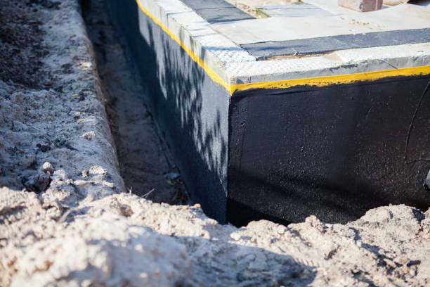 Professional Emergency Waterproofing technician working in Northport, AL